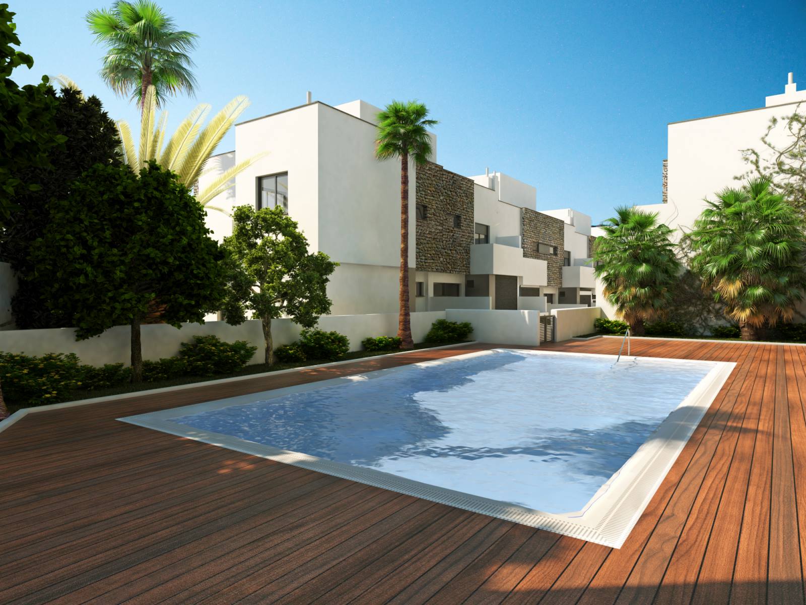 piscina con parqué y casas adosadas